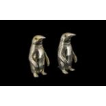 A Pair of Silver Novelty Salt and Pepper Pots In the Form of Penguins. Marked 800 Silver.