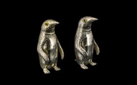 A Pair of Silver Novelty Salt and Pepper Pots In the Form of Penguins. Marked 800 Silver.