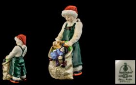 Royal Doulton Hand Painted Figure ' Santa's Helper ' HN3301. Designer A. Hughes. Issued 1991 - 1995.