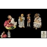 Royal Doulton - A Trio of Hand Painted Porcelain Figures of Small Size.