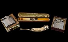 Miscellaneous Lot comprising two vintage Ronson chrome cased petrol lighters,