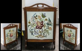 Edwardian Walnut Framed Fire Screen with a hand stitched embroidered panel depicting flowers,