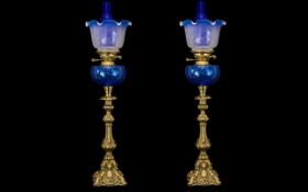 Pair of Bristol Blue Glass Oil Lamps of Large Size with matching blue glass shades, font and funnel,