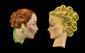 Art Deco Period Superb Hand Painted Wall Masks of Young Women, circa 1930s. Marked C & Co.