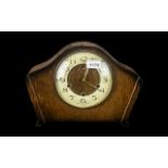 1950s Smith's Oak Case Mantle Clock with an enamel chapter ring and a 3 keyhole wind,