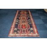 Deep Ground Large Iranian Runner. Full pile, Aztec design. Measures 305 x 120 cms.