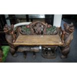 Black Forest Type 20thC Bear Hall Bench of carved and painted wood,