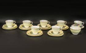 Colclough China Set of Six Pastel Yellow with Gilt Trim Cups and Saucers together with Sugar Bowl