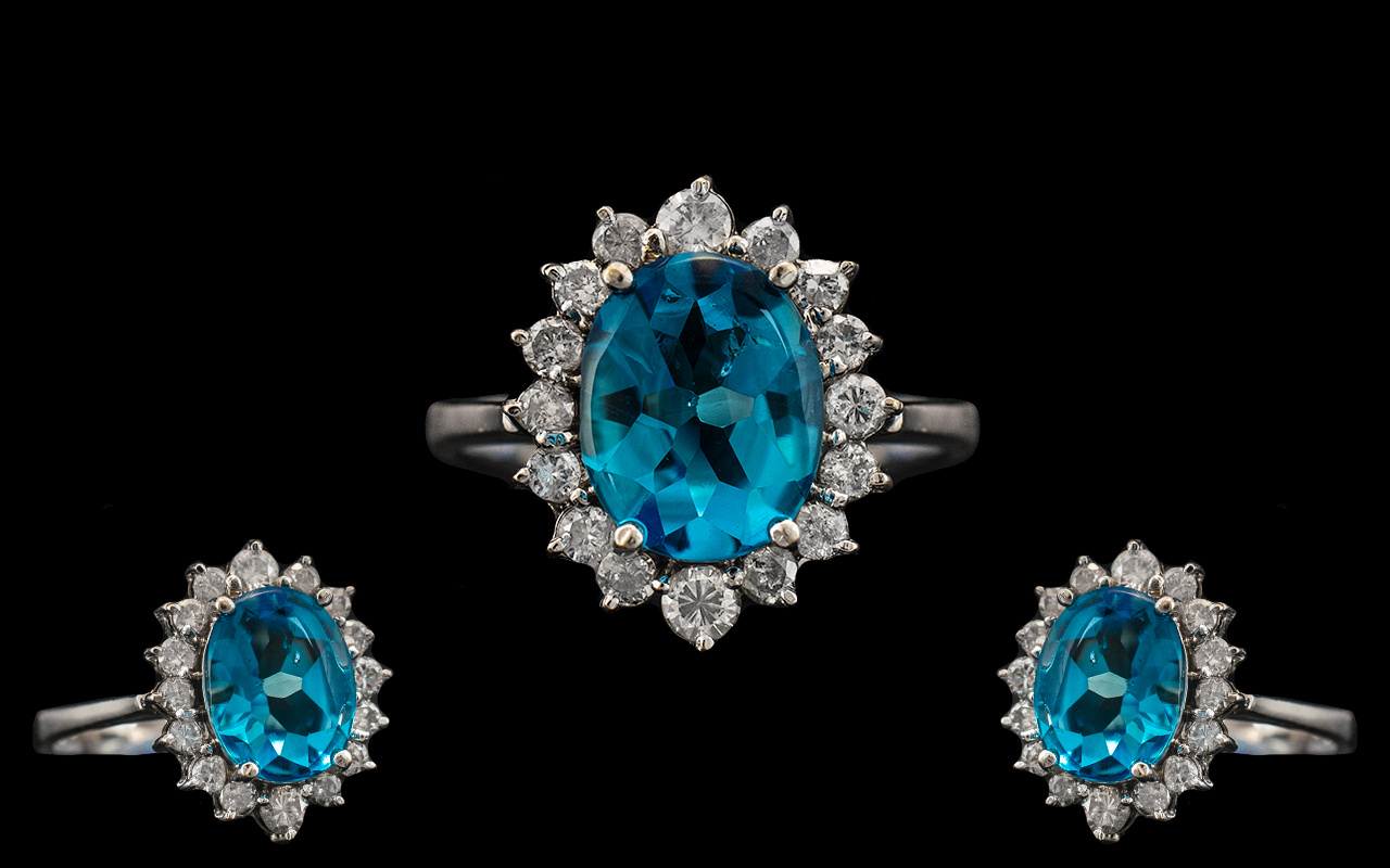 18ct White Gold - Attractive and Quality Blue Topaz and Diamond Set Cluster Ring.