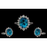 18ct White Gold - Attractive and Quality Blue Topaz and Diamond Set Cluster Ring.