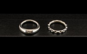 Two Sterling Silver Pandora Rings comprising a twirling band ring marked 925 ALE ring size K,