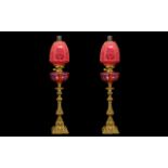 Pair of Ruby Glass Oil Lamps of Large Size with matching ruby glass shades, font and funnel,