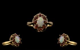 Ladies 9ct Gold - Attractive Ruby and Opal Set Ring, Flower head Setting. Fully Hallmarked for 9.