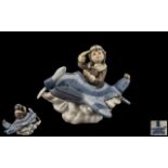 Lladro - Hand Painted Porcelain Figure ' Over The Clouds ' Little Boy Pilot. Model No 5697.