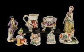 Four Various Antique Porcelain Figures comprising a Bow reclining deer, a pearlware lady,