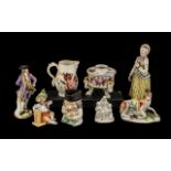 Four Various Antique Porcelain Figures comprising a Bow reclining deer, a pearlware lady,