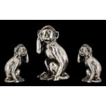 A Silver Novelty In The Form of a Performing Monkey. Fully Hallmarked for 925 Silver. 45.1 grams.