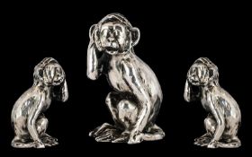 A Silver Novelty In The Form of a Performing Monkey. Fully Hallmarked for 925 Silver. 45.1 grams.