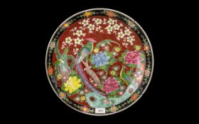 Japanese Meiji Period Charger of Large Size decorated in orange-brown enamels,