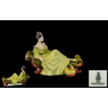 Royal Doulton Hand Painted Figure ' At Ease ' HN2473. Designer M. Davies. Issued 1973 - 1979.