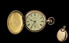 Gold Plated Waltham Watch with white enamel dial; A W W Co. Waltham, Mass.