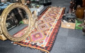 Large Turkish Kelim Tribal Weave Carpet with a coloured geometric design, 11 feet (330cms) x 3.