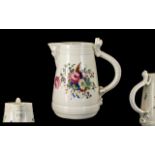 Antique Porcelain Floral Decorated Jug with an unusual lizard handle and a mask head spout.