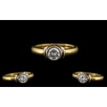 18ct Yellow Gold Attractive Single Stone Diamond Set Ring of Contemporary Design.