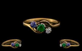 18ct Gold - Attractive Trio of Diamond, Emerald and Sapphire Set Dress Ring.