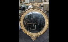 Large and Impressive Reproduction Regency Style Gilded Resin Mirror, crowned with an eagle,