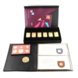 A collection of coins, mostly modern Commemoratives including Olympics gold plated set