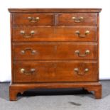 An old oak chest of drawers, of small size, fitted with two short and three long drawers, bracket