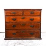 An old hardwood chest of drawers,