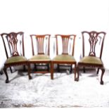 Set of four Chippendale style stained walnut dining chairs,