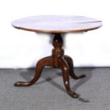 An oak pedestal table,