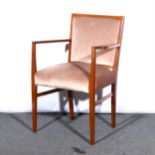 A teak office chair,