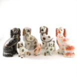 A collection of twelve Staffordshire King Charles Spaniels