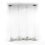 A collection of fourteen tall glass vases, ideal for use as table centres