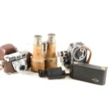 A Zeiss 8x monocular field glass, binoculars, and other cameras