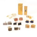 A collection of cufflinks, Dunhill, Balmain, a Dunhill lighter, cigar cutter.