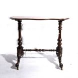 A Victorian inlaid walnut stretcher table