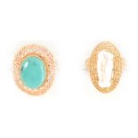 A turquoise dress ring and a pearl dress ring.