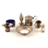 A Victorian silver mustard pot, Thomas Hayes, Birmingham 1892, and other small silver items.