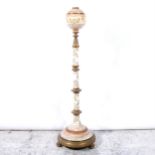 A Victorian earthenware and lacquered brass standard lamp base
