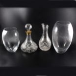 A pair of Orrefors glass decanters, a pair of Thomas Webb square cut-glass decanters, etc