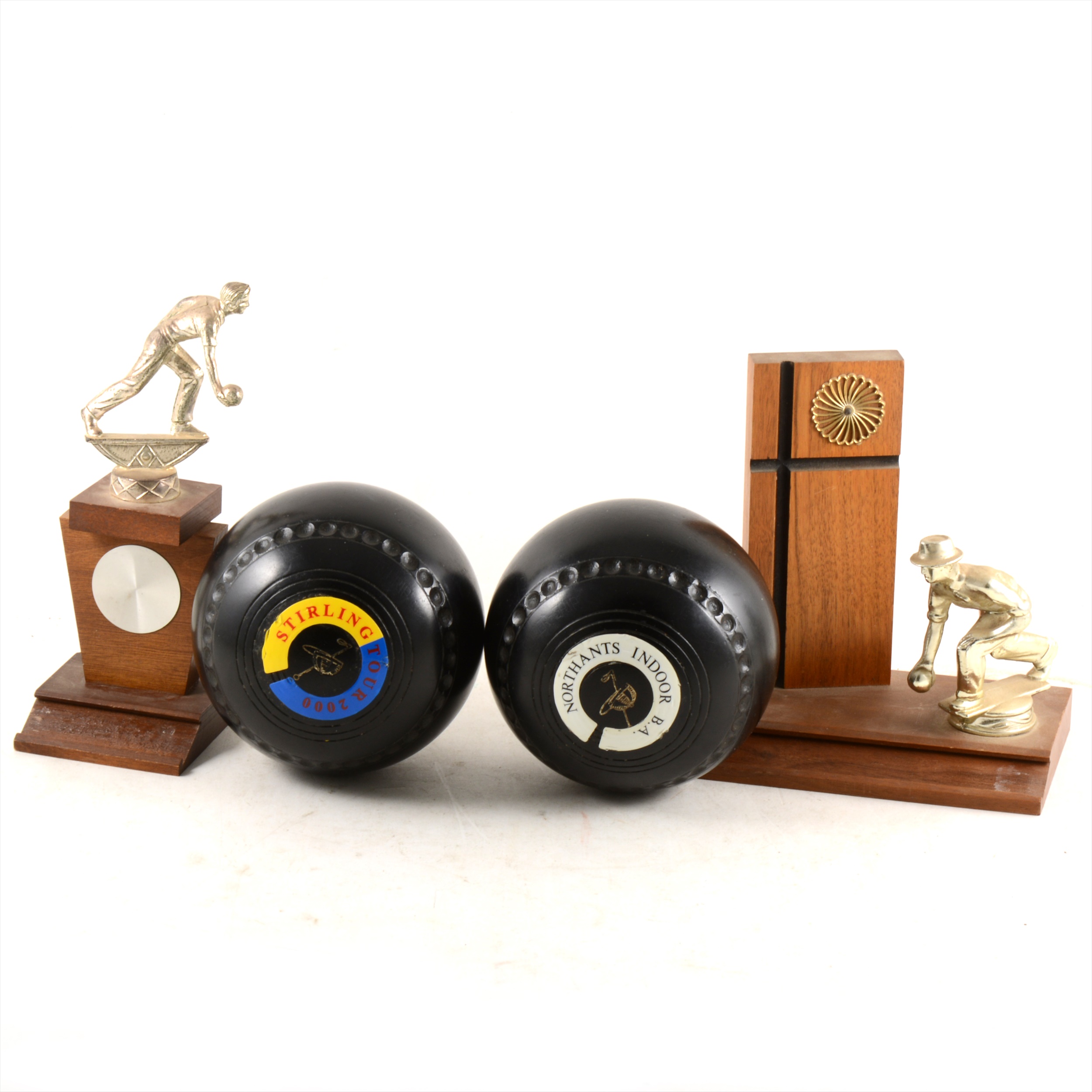 Bowling woods, bowling trophies in a leatherette bag.