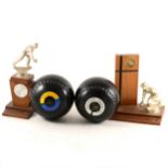 Bowling woods, bowling trophies in a leatherette bag.