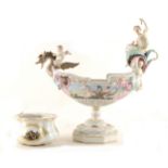 A Meissen bowl, reserves painted in the manner of Heroldt; and a Capodimonte style boat shape
