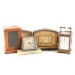 A brass cased carriage clock, an Art Deco chromed desk clock by Crometa, etc