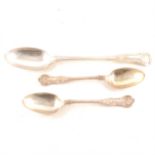 A Victorian silver basting spoon and a pair of similar spoons.